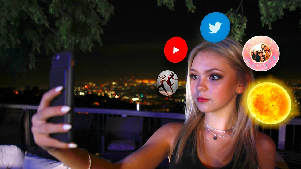 A girl takes a selfie at night with city lights behind. Icons of apps and a sun float around her head, showing a digital theme.