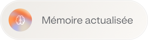 Badge arrondi avec une icône en dégradé et le libellé « Mémoire mise à jour »