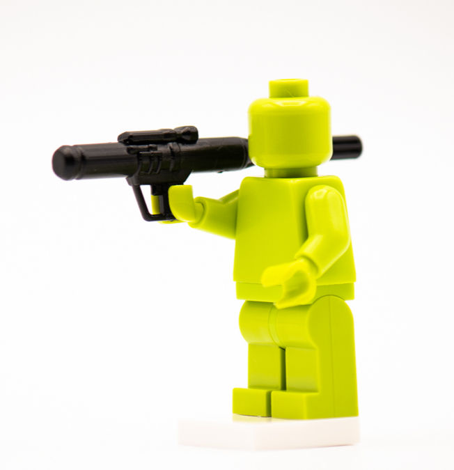 Thumbnail: Lime green building brick figure with rocket launcher