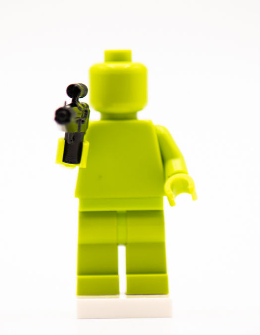 Thumbnail: Lime green minifigure holding a Mandalorian Carbine Blaster