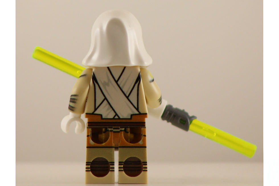 Thumbnail: Lego minifigure from back, white hood, yellow lightsaber