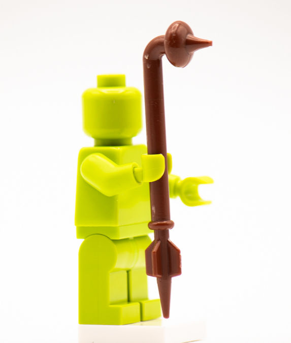 Thumbnail: Lime green custom printed building brick figure holding brown Gaffi stick building brick accessory
