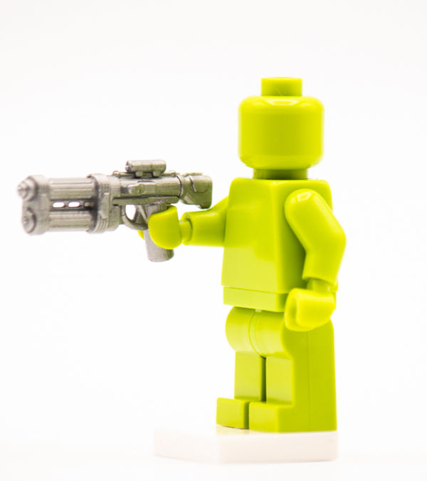 Thumbnail: Lime green building brick figure holding weapon.