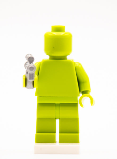 Thumbnail: Lime green minifig demonstrating SE-14R blaster, silver