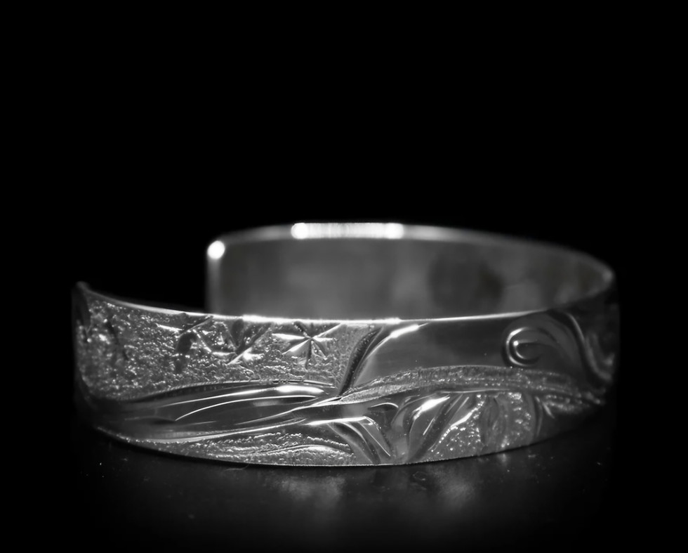 Thumbnail: Sterling silver cuff bracelet with carved eagle design