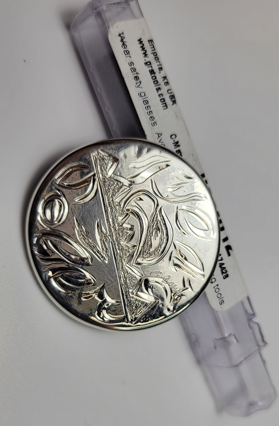 Thumbnail: Silver coin with floral design, CMPS, One-of-a-kind Coin, and text labels visible.