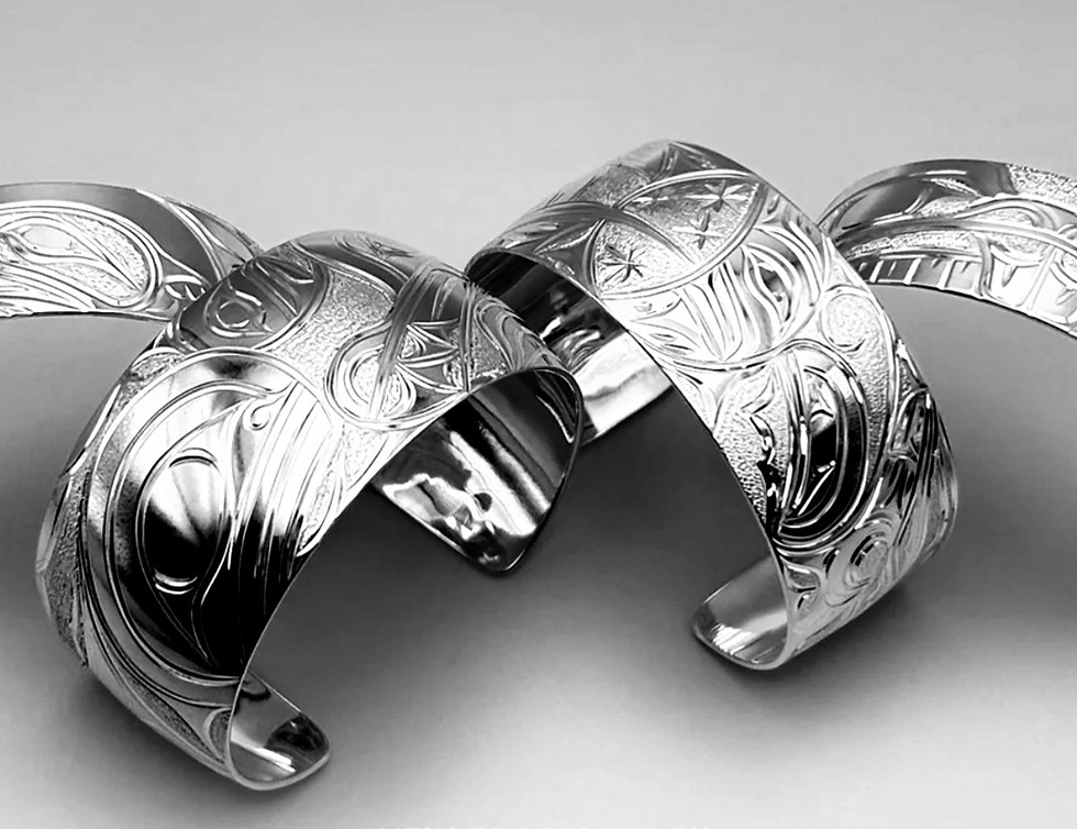 Thumbnail: Intricate silver bracelets, Northwest Coast design