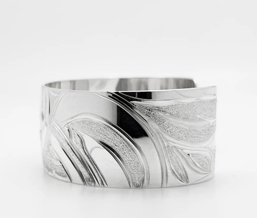 Thumbnail: Sterling silver cuff bracelet, detailed carving, Northwest Coast art