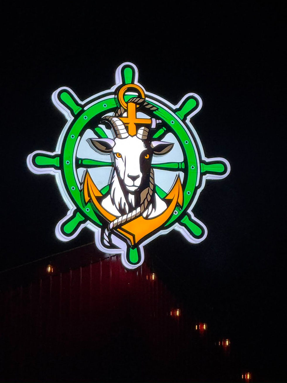 Goat logo with ship wheel for custom printing and decals.
