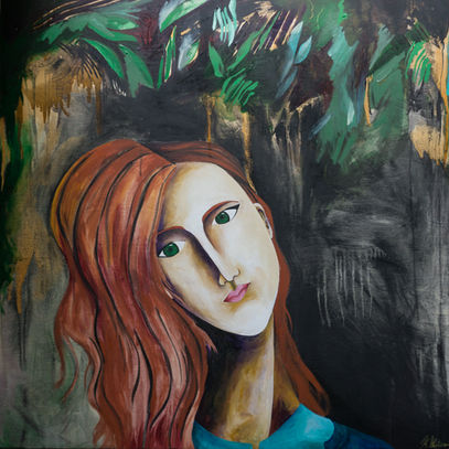 red haired green eyed woman with her head tilted to the side looking straight on with a blue collared shirt against a black background with leaves from a jungle.