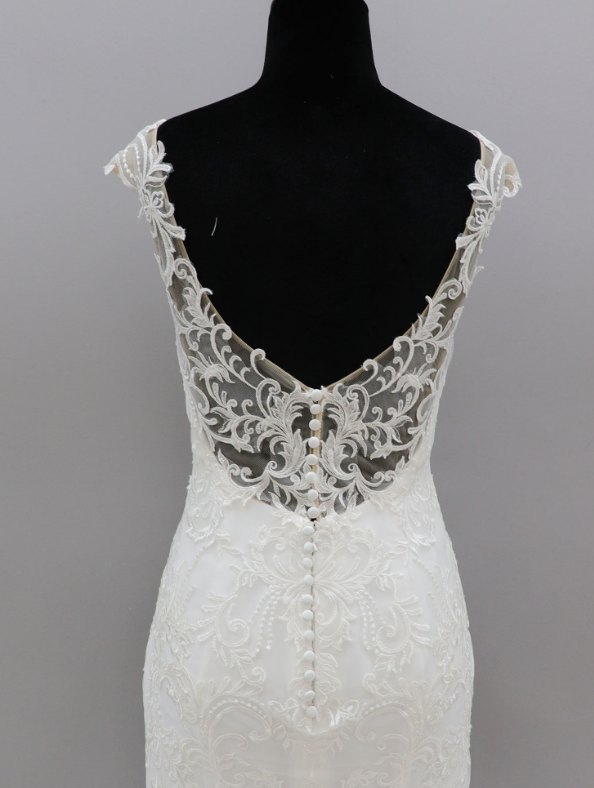 Thumbnail: Dramatic Fit and Flare Bridal Gowns With Cap Sleeves
