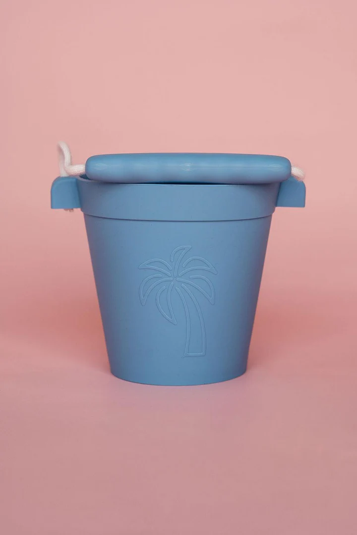 Blue flexible beach bucket.