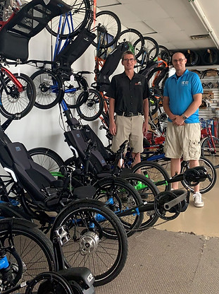 Dad in the trike showroom.jpg