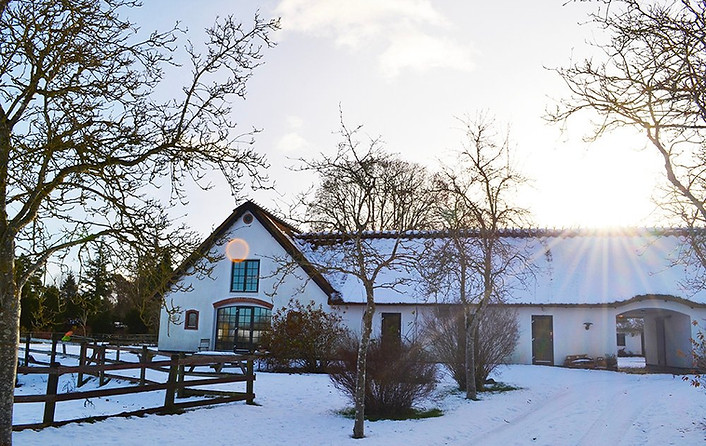 snow covered farmhouse Denmark