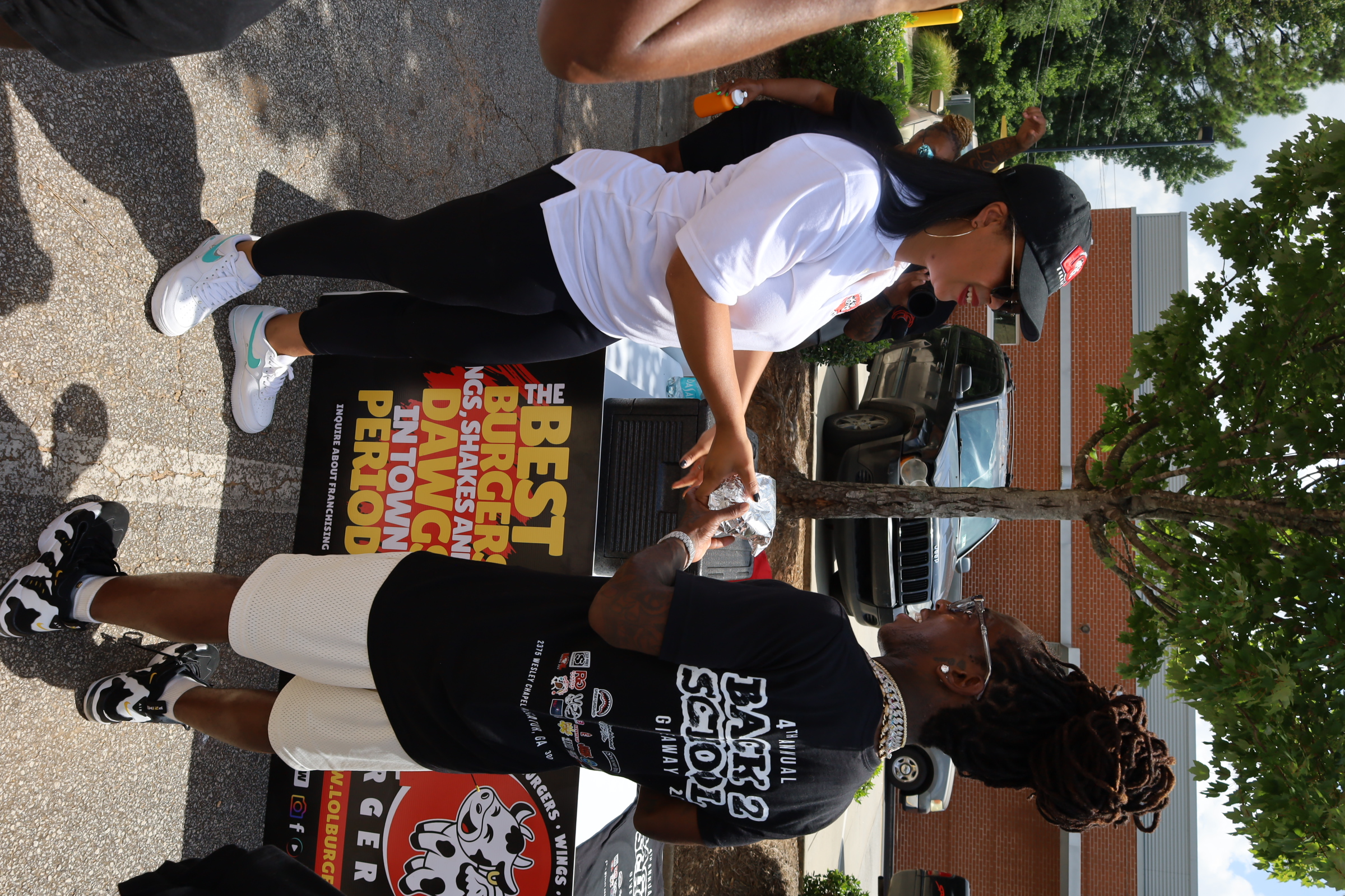 LOL Burger Bar Gives Back with Singer Jacques & V103