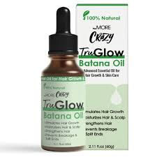 TruGlow Batana Oil product bottle with text labels and descriptions for use.