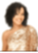 Smiling woman with curly hair and gold dress