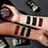 الصورة المصغرة: Arms displaying various cosmetic swatches, showcasing different makeup shades and colors.
