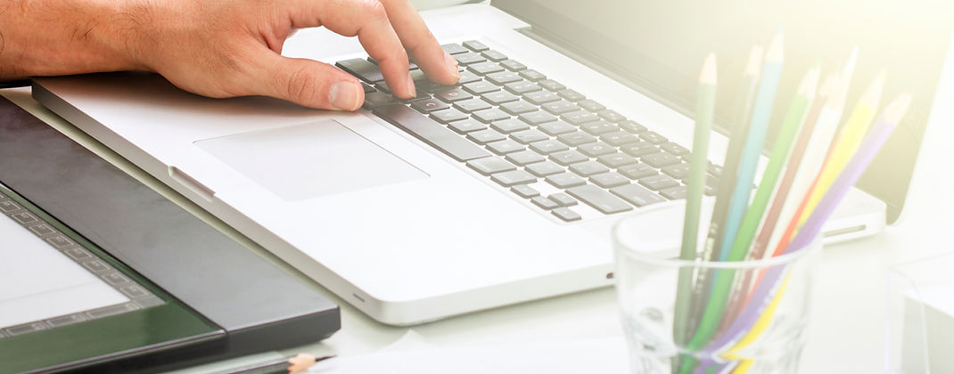 Hand on Laptop