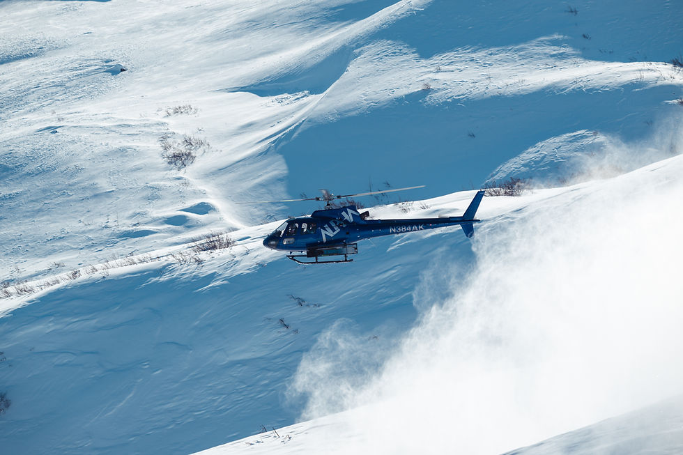 helicopter transporting a group of skiiers in alaska