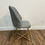 Thumbnail: Grey dining chair with x gold legs
