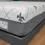 Thumbnail: Queen-size Memory+ mattress featuring gel memory foam and quilted top layer on modern bed frame