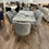 Thumbnail: grey dining table and chairs with X gold legs