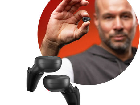 Signia Active Pro IX hearing aids, with a man holding one of the small, in-ear devices