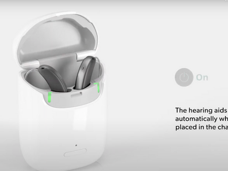 The image features the Signia Styletto IX hearing aid and its portable charging case.