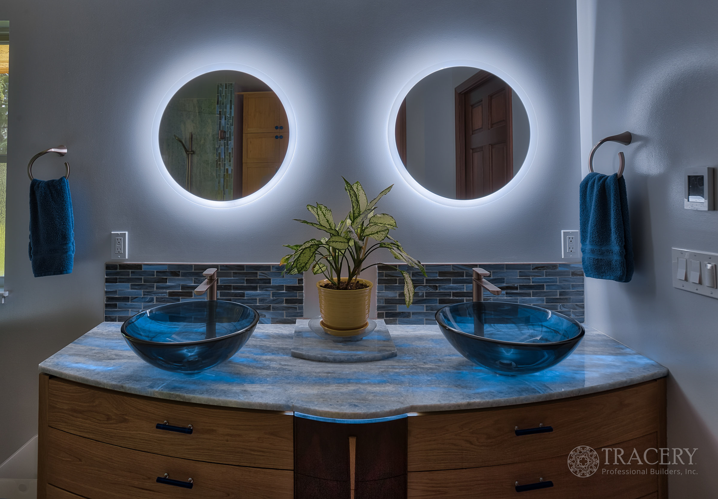 McDonald Lane illuminated blue stone - Tracery Builders