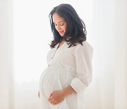 Pregnant woman under chiropractic care in New Haven County