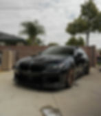 paint correction in sacramento on a black bmw