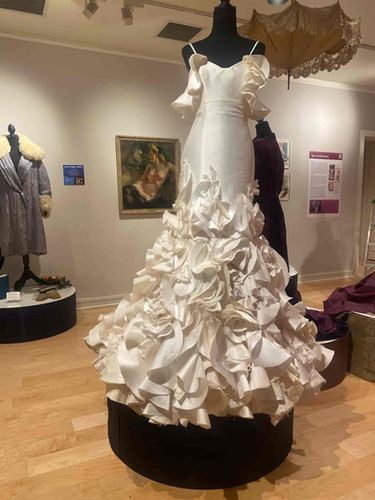 Barbara Kavchok's Camelia silk wedding dress on display at an art museum in Bethlehem