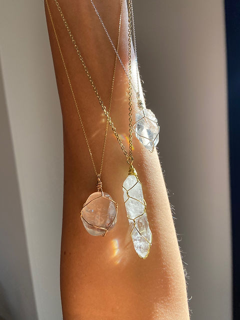 Clear quartz point pendant