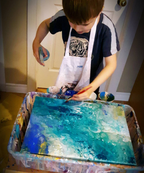 Lukas working on a masterpiece