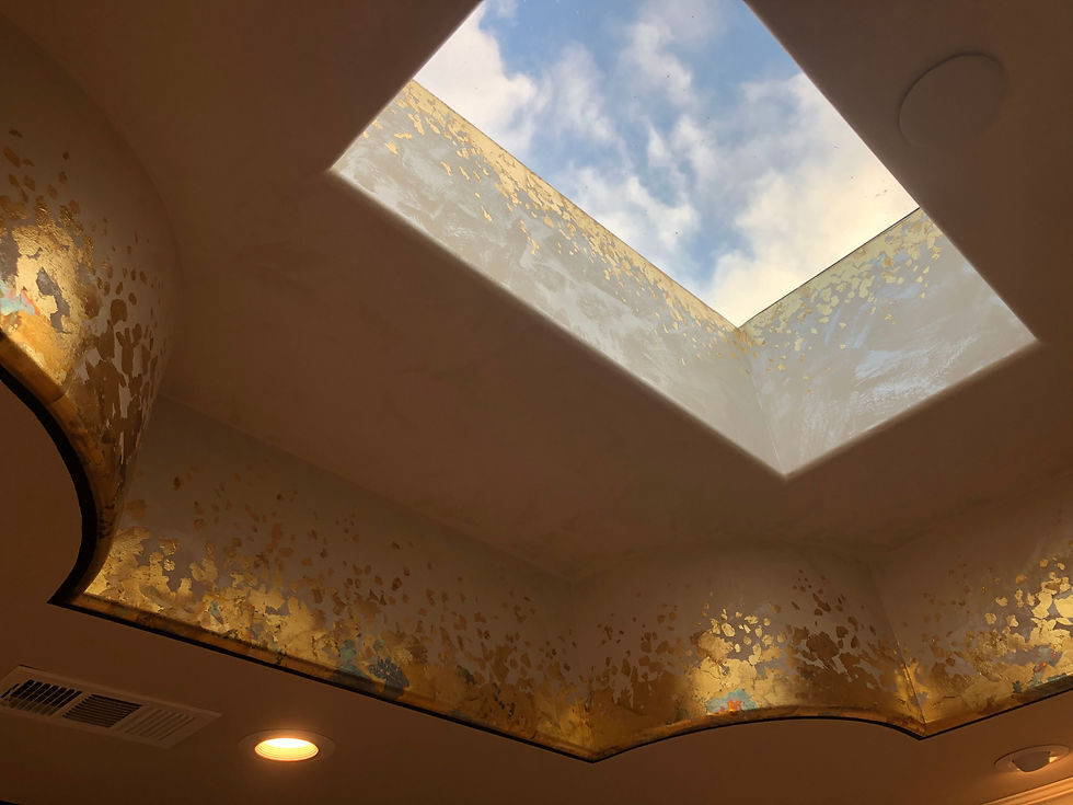 Gold leaf flakes on kitchen soffit