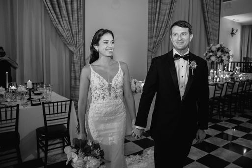 Bride and groom making their reception entrance at Hotel El Convento