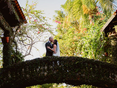 bride and groom kissing on their first look