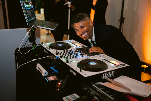 DJ playing music while guests celebrate during Hotel El Convento wedding