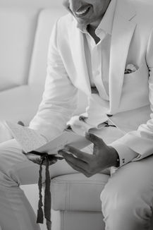 groom reading his vows happy