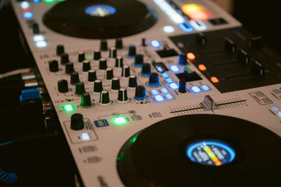 DJ setup with vinyl turntables at Hotel El Convento wedding reception.