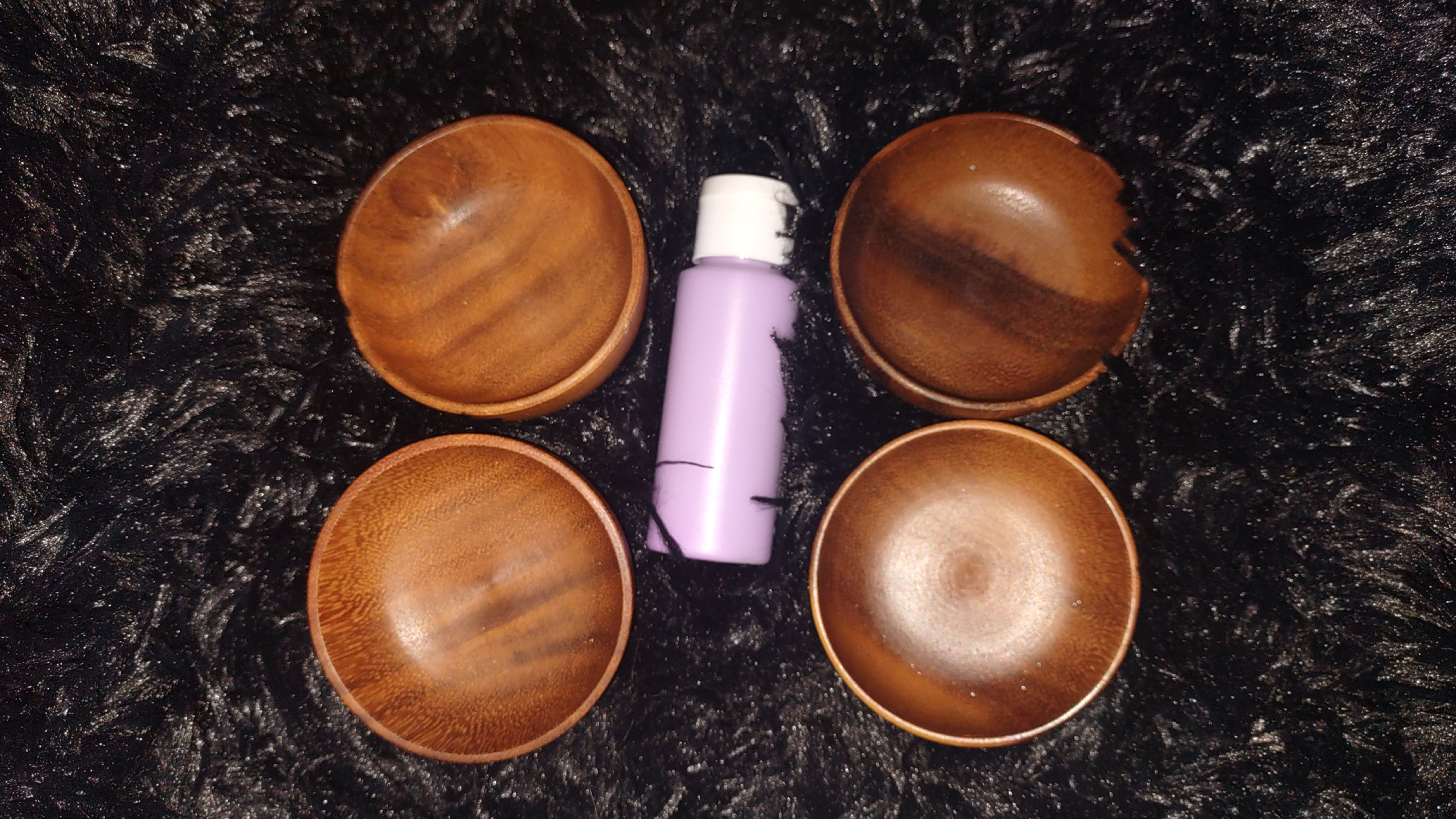 small round wooden bowl