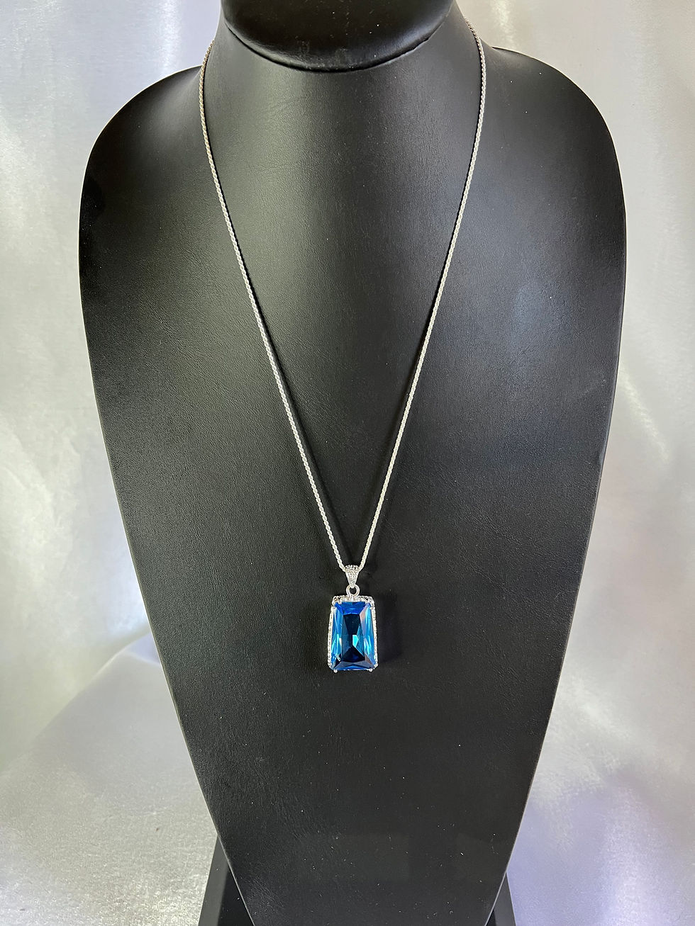 Blue Topaz Pendant set in Silver on Silver Chain