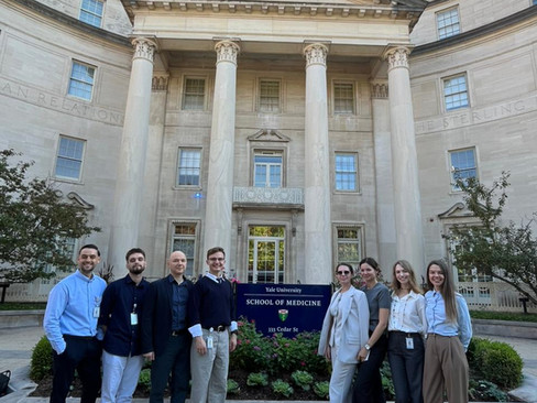 Six Ukrainian doctors with Yale School of Medicine faculty after completing Ukraine Without Pain training program