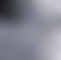 (C) lilychvt - Journal opened on a white couch with a journal entry filled in. Black pen on top of journal ready to write down creative writing tips for a first draft.