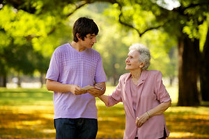 young_man_elderly_woman_visiting.jpeg