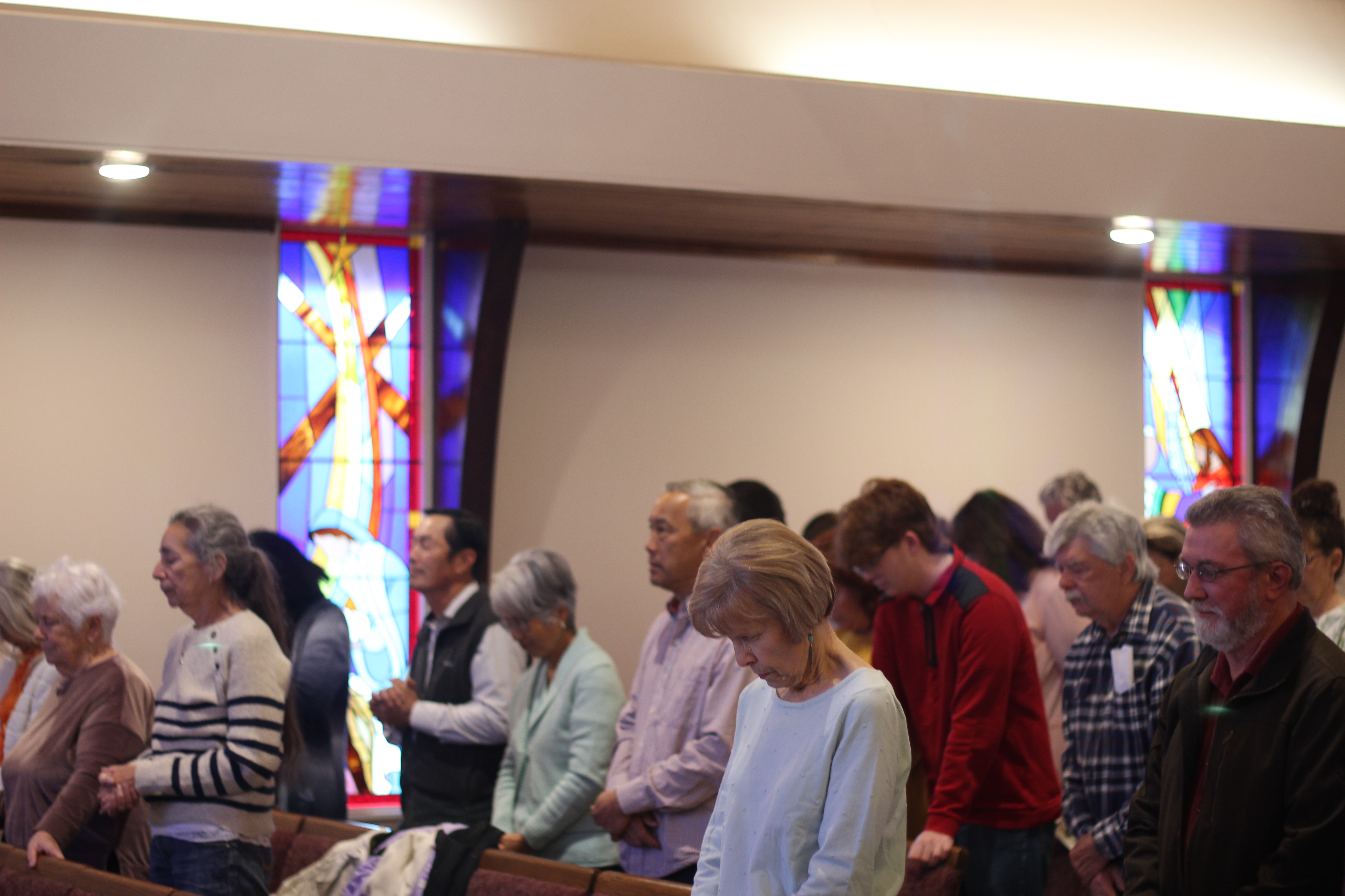 Congregation praying