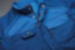Blaue Arbeitsjacke mit Reißverschluss und Taschen