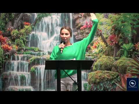 Michelle DeSimone teaching on stage at River Church Jersey
