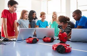 Students Listening to Instructions From Their Teacher